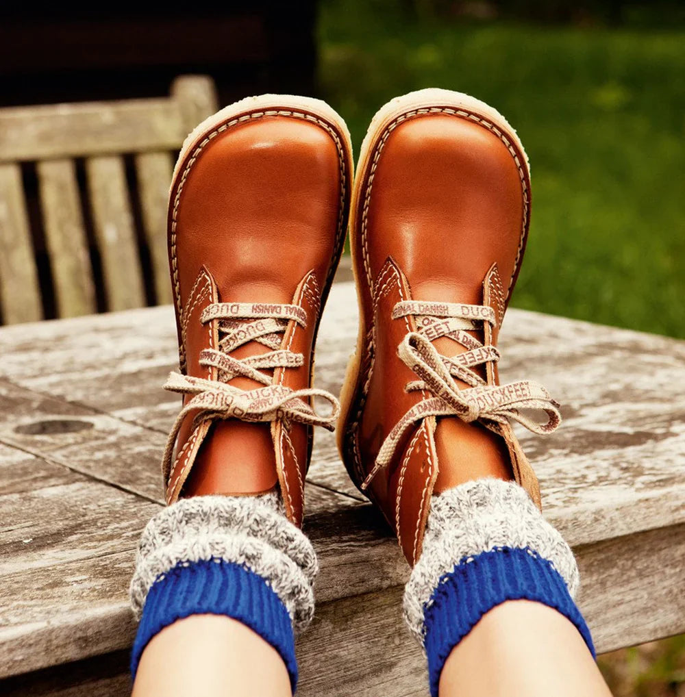 A pair of Duckfeet Sjælland lace-up shoes in a natural tan leather, showcasing the handcrafted stitching and textured rubber sole.