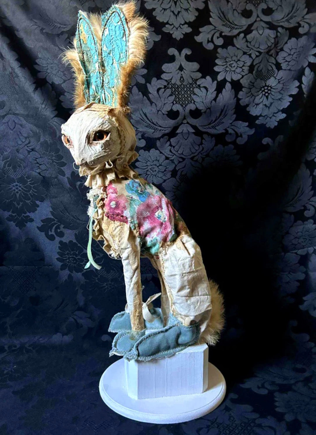 Hip hip decay poupon sitting rabbit sculpture