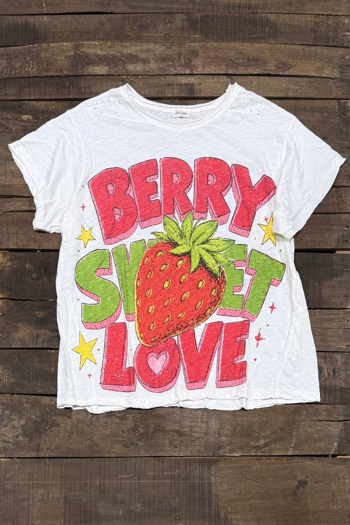 Worn and weathered tee berry sweet