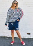 person wearing HAMMILL & CO WOMENS RETRO STRIPE COLLARED SWEAT IN NAVY/WHITE - Stay Wild Collective  