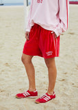 person wearing Hammil and co velour shorts red - Stay Wild Collective  
