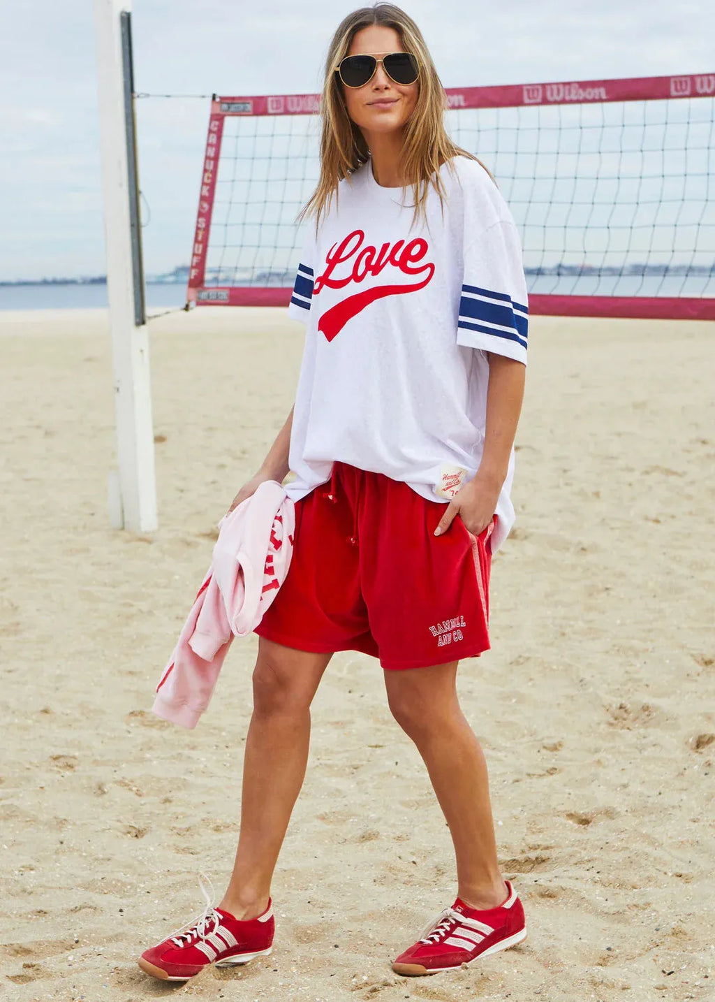 person wearing Hammil and co velour shorts red - Stay Wild Collective  