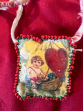 Paper doll heart and child necklace