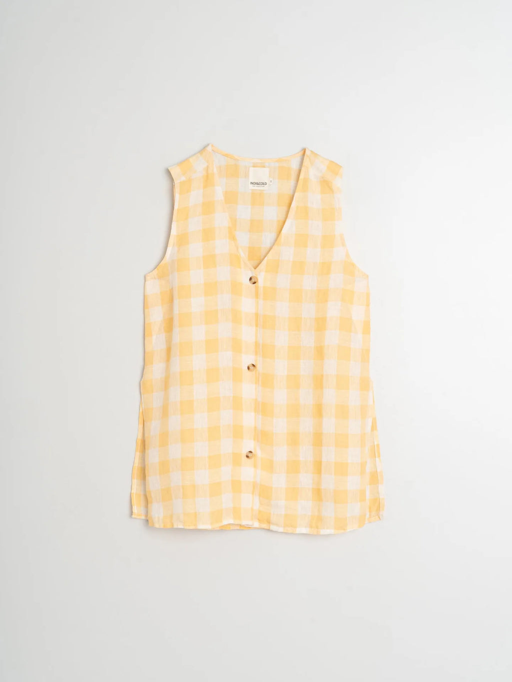 Yellow checkered sleeveless shirt on a light gray background