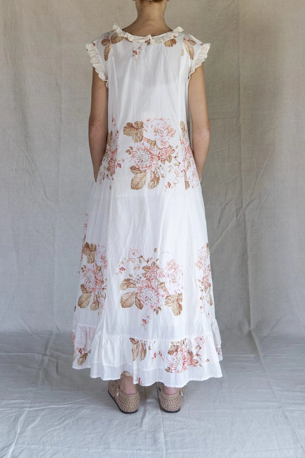 person wearing Les Ours Dress Ancolie Cotton Flowers - Stay Wild Collective  Dress