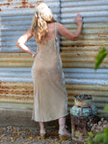 person wearing Long velvet slip dress gold - Stay Wild Collective  