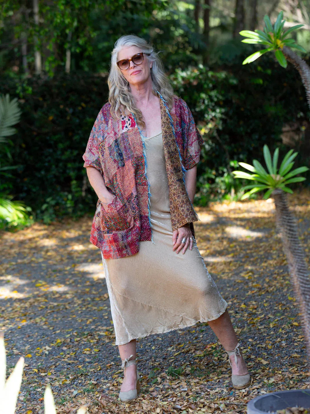 person wearing Long velvet slip dress gold - Stay Wild Collective  