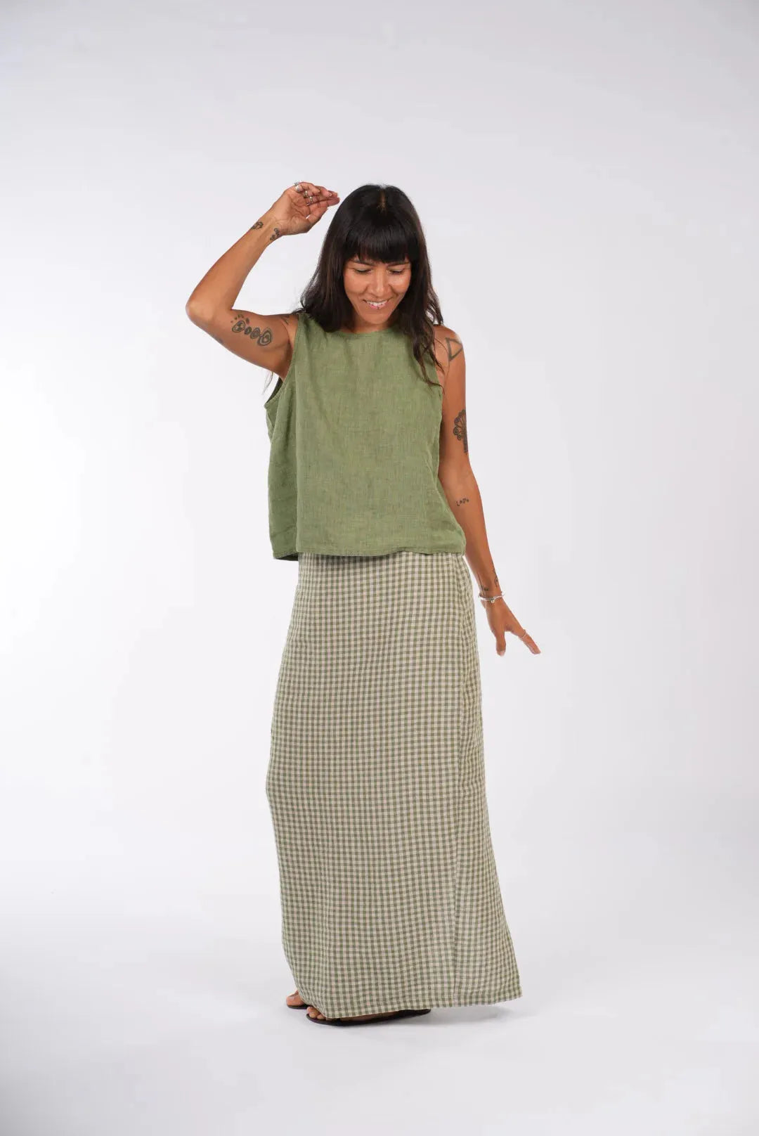 person wearing Montaigne French linen green check skirt - Stay Wild Collective  