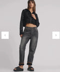 person wearing One teaspoon Bandits Low Waist Boyfriend Denim Jeans - Worn Black SALE - Stay Wild Collective  