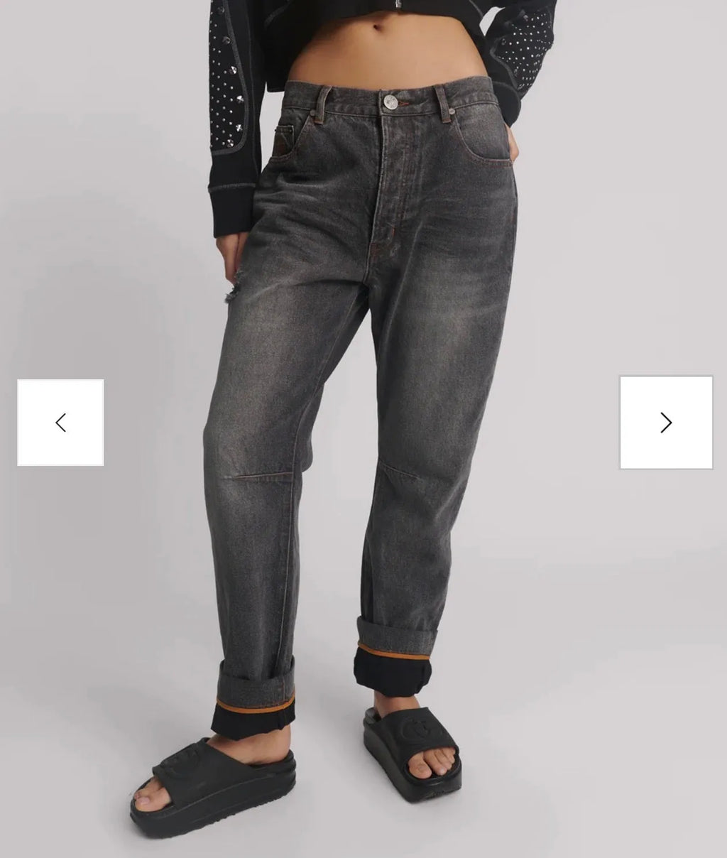person wearing One teaspoon Bandits Low Waist Boyfriend Denim Jeans - Worn Black SALE - Stay Wild Collective  