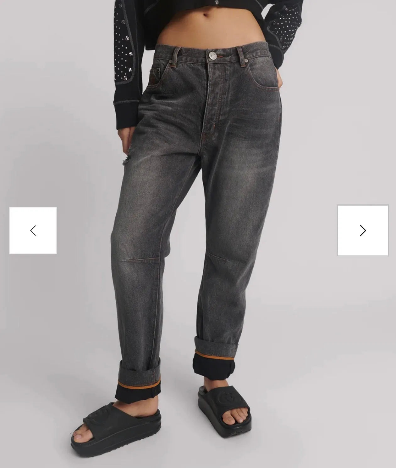person wearing One teaspoon Bandits Low Waist Boyfriend Denim Jeans - Worn Black SALE - Stay Wild Collective  