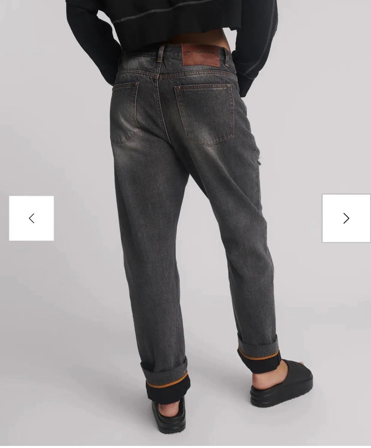 person wearing One teaspoon Bandits Low Waist Boyfriend Denim Jeans - Worn Black SALE - Stay Wild Collective  