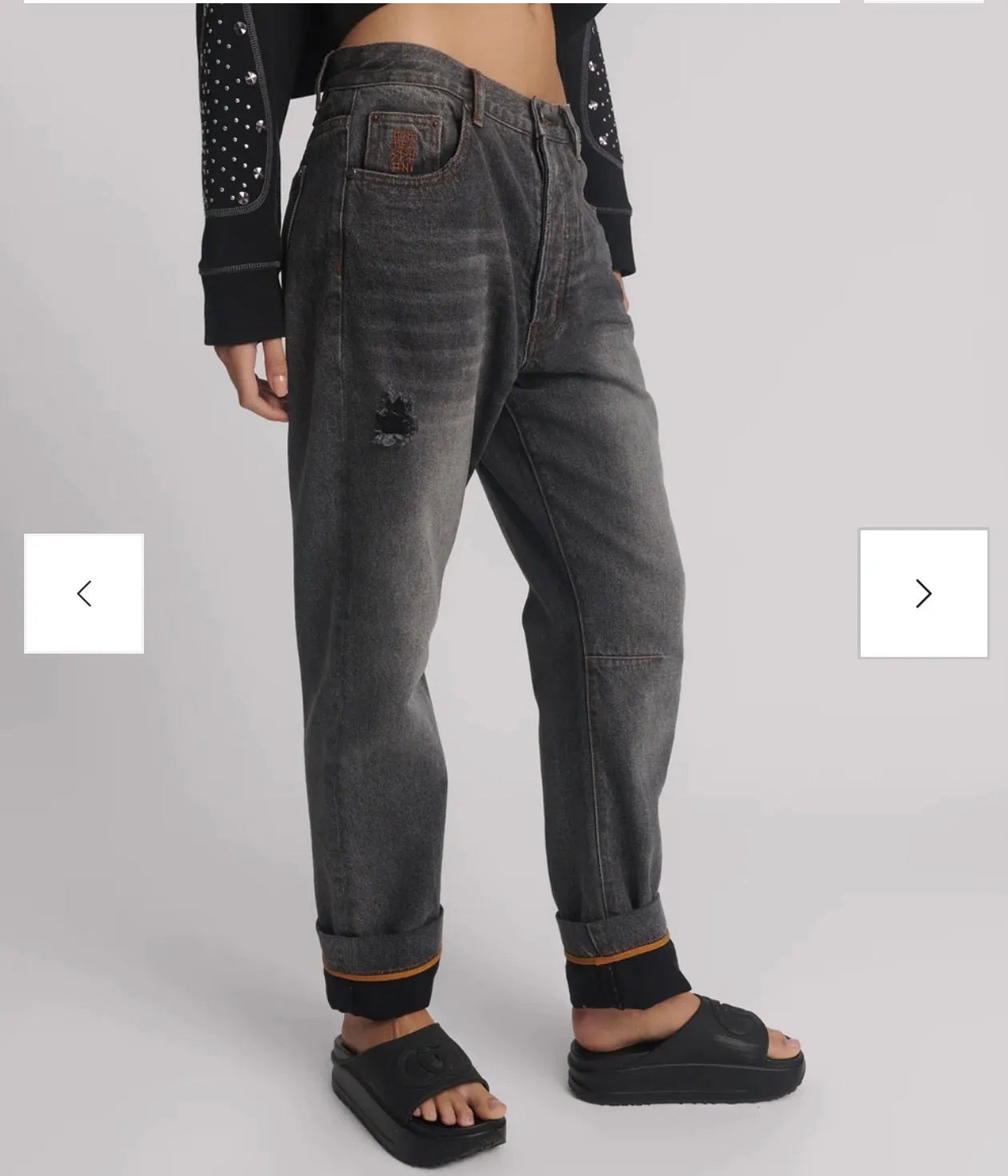 person wearing One teaspoon Bandits Low Waist Boyfriend Denim Jeans - Worn Black SALE - Stay Wild Collective  