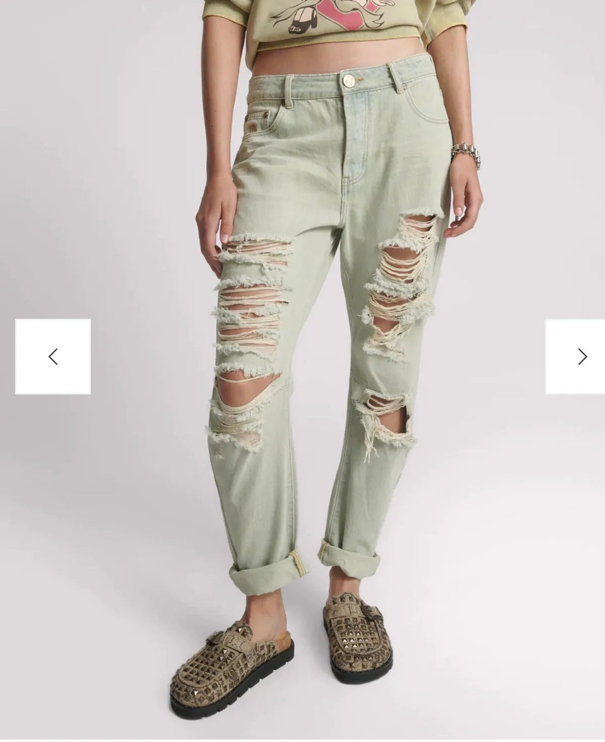 person wearing One teaspoon messed up saints jeans SALE - Stay Wild Collective  apron