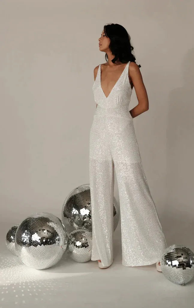 person wearing Pasaduchas glimmer glimmer pantsuit SALE white - Stay Wild Collective  