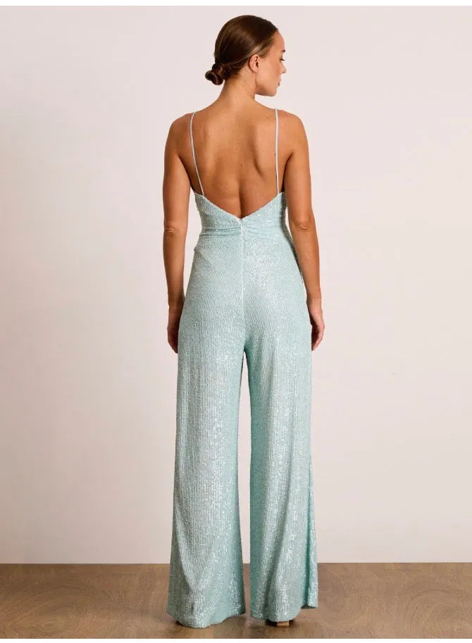 person wearing Pasaduchas glimmer glimmer pantsuit SALE white - Stay Wild Collective  