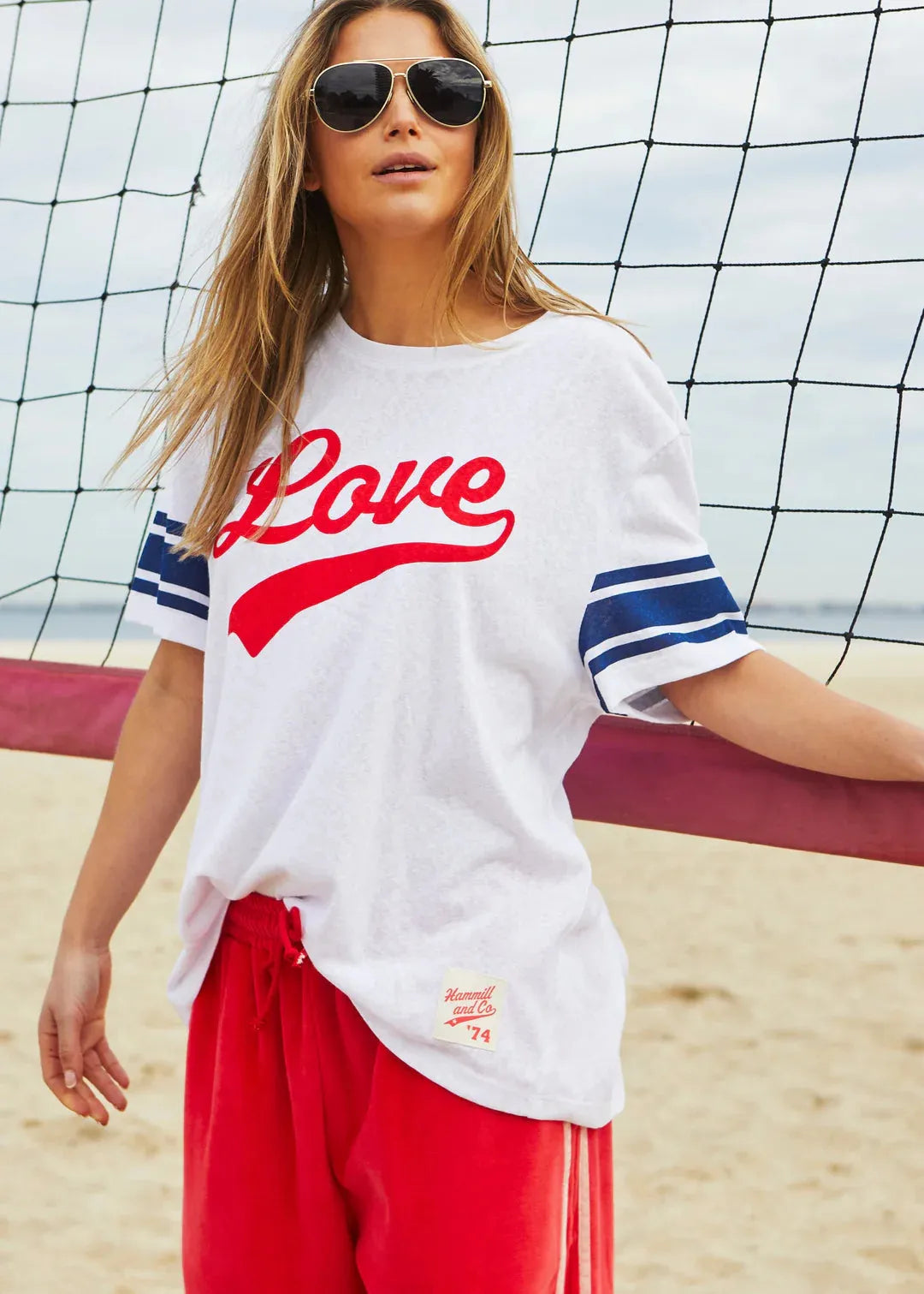 person wearing URBAN LOVE TEE - WHITE - Stay Wild Collective  