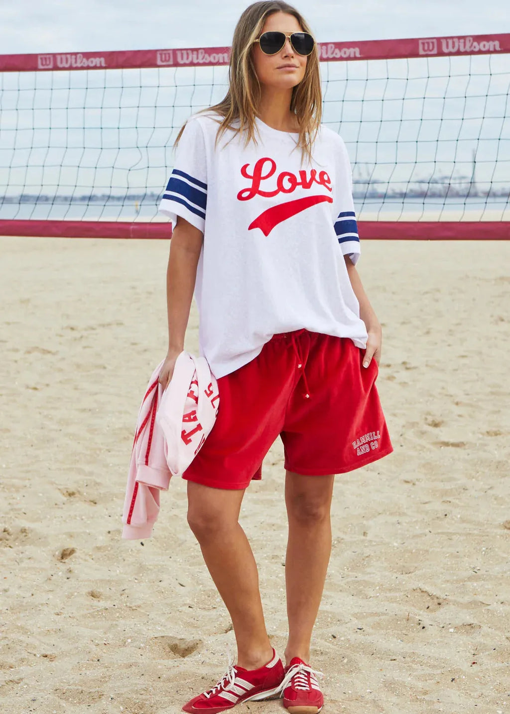 person wearing URBAN LOVE TEE - WHITE - Stay Wild Collective  